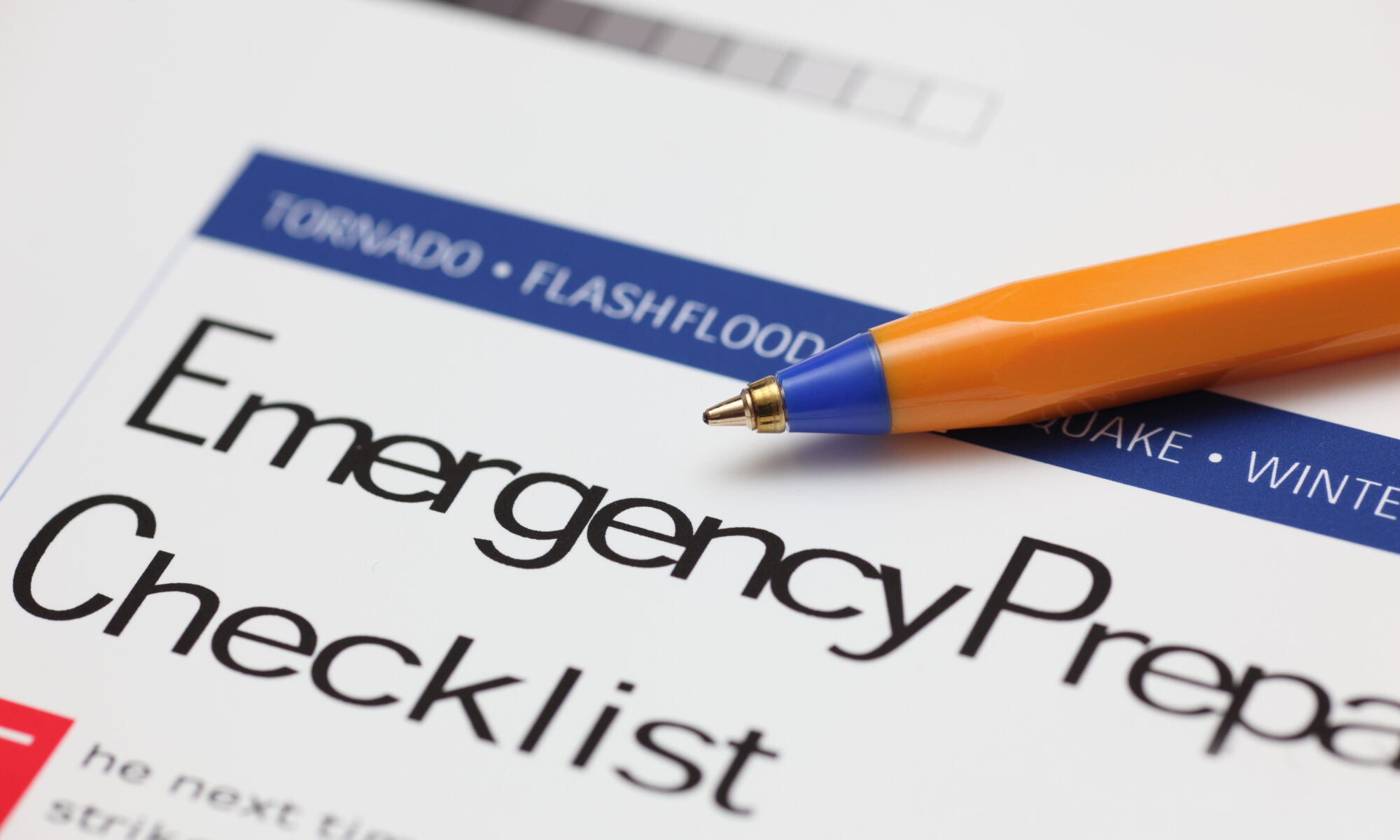 Emergency,Checklist,And,Ballpoint,Pen.,Close up.